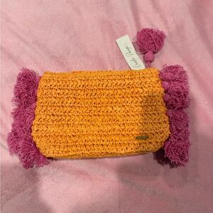 Charlie Paige clutch NWT in orange and pink raffia with zipper.